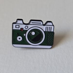 Green and White Camera Pin